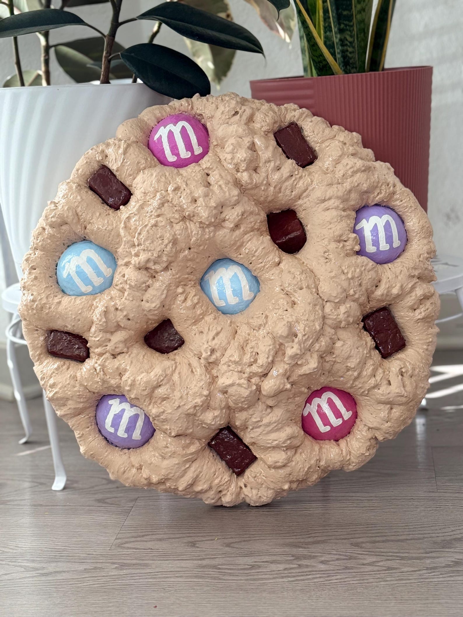 Colorful wall art: pastel M&M jumbo cookie sculpture by JOIRUSH